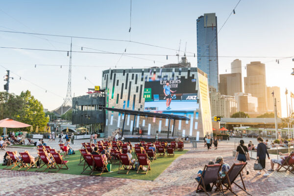 Tennis Fans watching the Australian Open Tennis at Federation Square. January 2019.